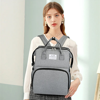A foldable diaper bag with an insulated changing table pocket and ample storage. Mom's backpack