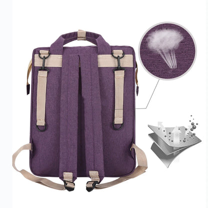A foldable diaper bag with an insulated changing table pocket and ample storage. Mom's backpack